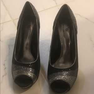 Silver and black heels